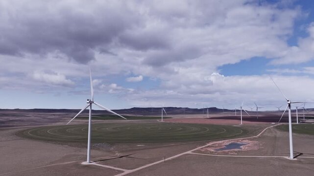 Aerial View of a Wind Farm Amid Farmland on the Rural Plains of Bridger, Montana