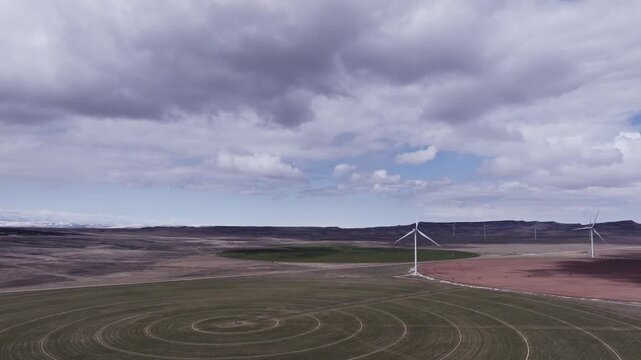 Aerial View of a Wind Farm Amid Farmland on the Rural Plains of Bridger, Montana