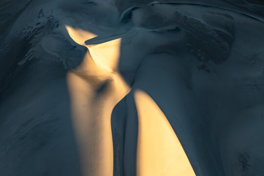 Abstract dune pattern with wind-shaped sand texture background