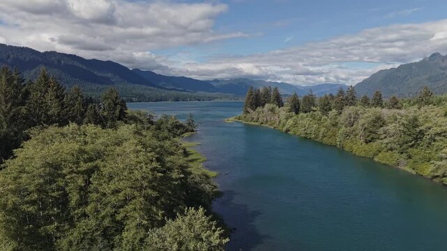 Aerial View of Lake Quinault, Forested Mountains, and Quinault River in Amanda Park, Washington, USA. July 10, 2026. 