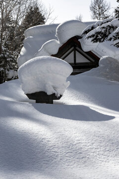 Massive Snowdrift Around Traditional Roof in Niseko