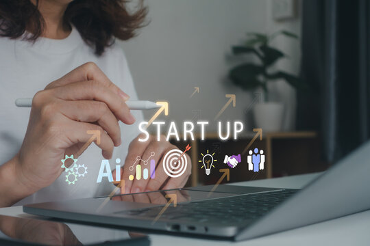 Startup business growth with AI technology, entrepreneur using laptop and digital pen for strategic planning, innovation, analytics, teamwork, business development and future success concept.