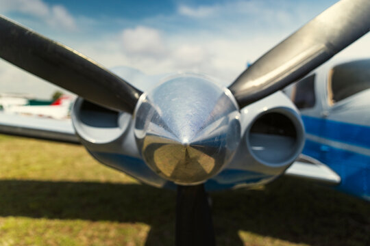 Close-up view of a propeller aircraft on a sunny day