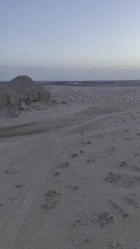 Drone following horse rider at Al Arbaa Mountain, Al Ahsa, Saudi Arabia