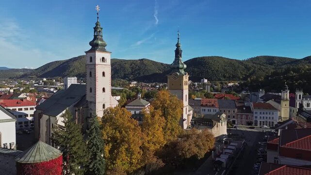 Aerial autumn view of Banska Bystrica SNP Square with church