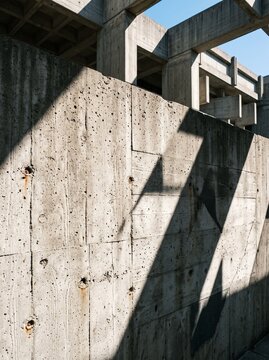 Low-Angle Brutalist Concrete with Geometric Shadows