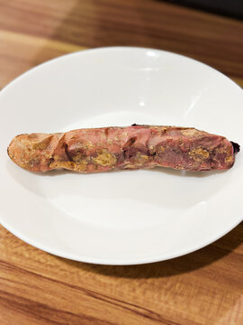piece og grilled sweet potato for dinner