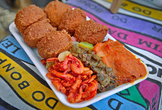 Traditional Brazilian Acaraje Street Food with Vatap&aacute; and Shrimps. Traditional Brazilian food.