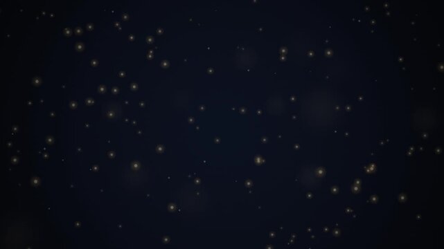 Golden light particles forming a frame against a dark background