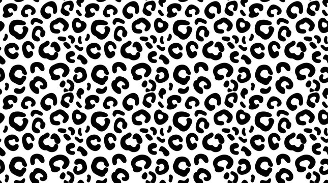 Seamless repeating pattern of black leopard skin spots on a white background for fashion design textiles wallpaper and trendy graphic art projects