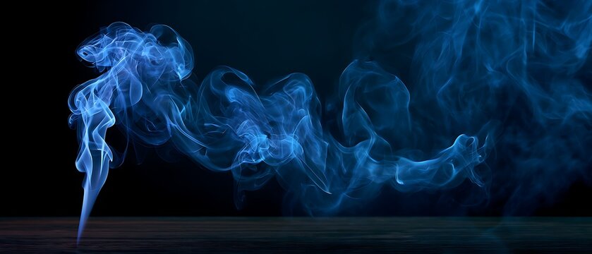 Blue smoke plume drifting above a dark reflective surface