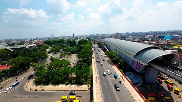 Aerial view of riverside settlement along Musi River in Palembang