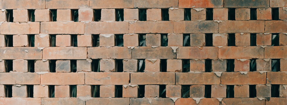Perforated Brick Wall Texture Background Featuring Modern Architectural Design Pattern