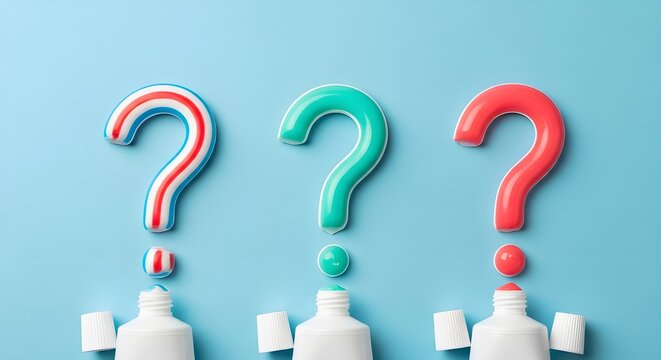 Toothpaste question marks formed by three tubes of dental cream arranged against a solid bright pastel blue background surface