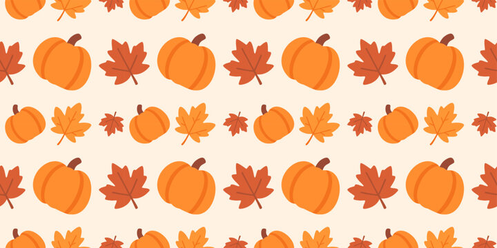 bright orange pumpkins and falling autumn leaves seamless pattern