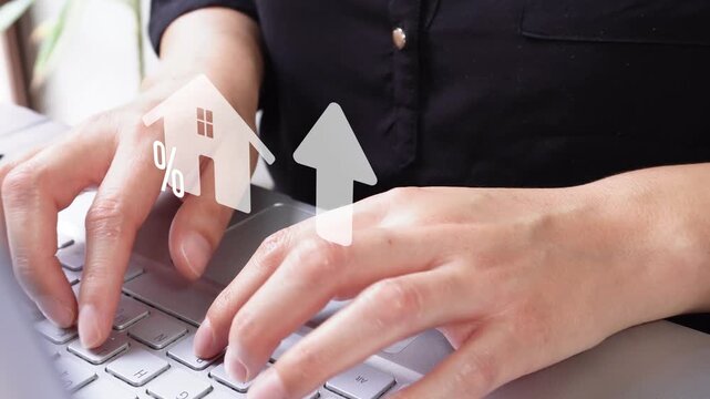 User interacts with laptop showing home price increase