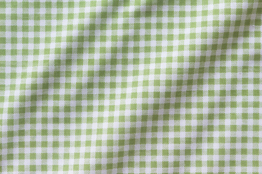 Crumpled green gingham fabric