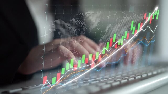 A business professional is analyzing financial graphs on a laptop in a modern office, showcasing stock market data visualization combined with upward trends and market analysis. Copula