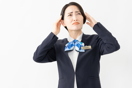 制服を着た受付係の女性　ジョブイメージ