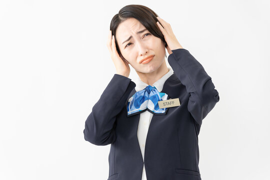 制服を着た受付係の女性　ジョブイメージ