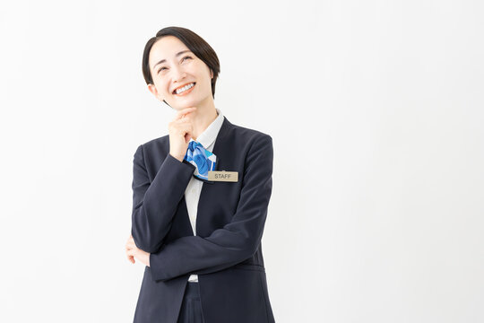 制服を着た受付係の女性　ジョブイメージ