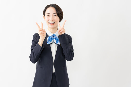制服を着た受付係の女性　ジョブイメージ