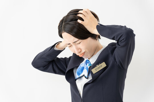 制服を着た受付係の女性　ジョブイメージ