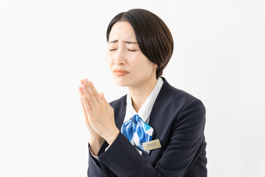 制服を着た受付係の女性　ジョブイメージ