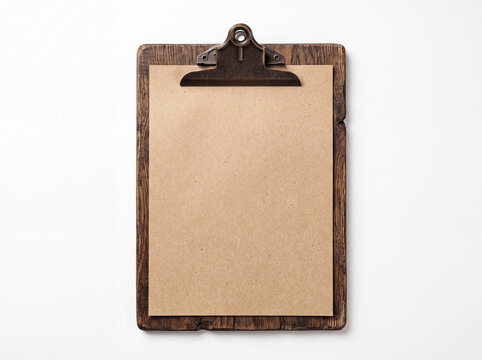 Rustic wooden clipboard mockup, top view flat lay of blank kraft paper attached to a vintage dark wood clipboard isolated on white background.