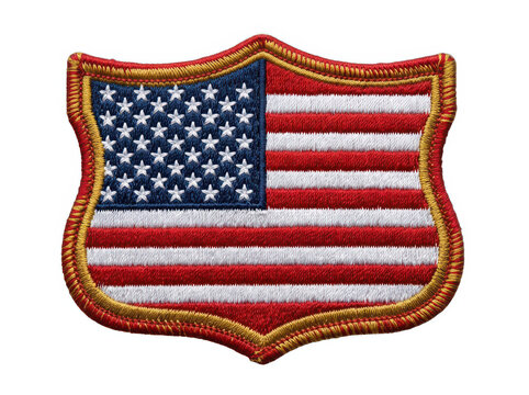 American flag emblem with gold border in a shiny textured shield shape design