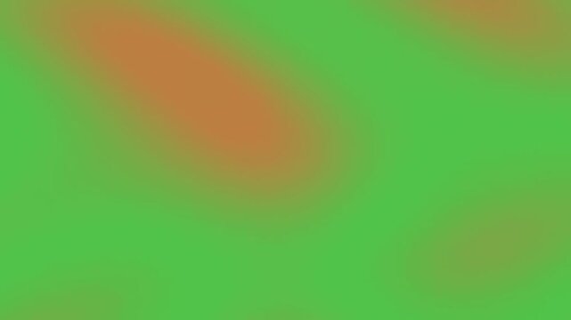 Organic green and orange blurred shapes shifting slowly