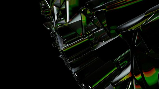 Abstract close up of smooth black glossy shapes with subtle green light reflections on a dark background for modern background and technology texture