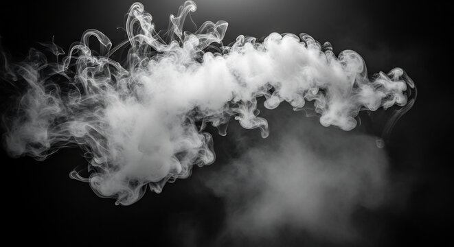 Thick white smoke cloud against black background.