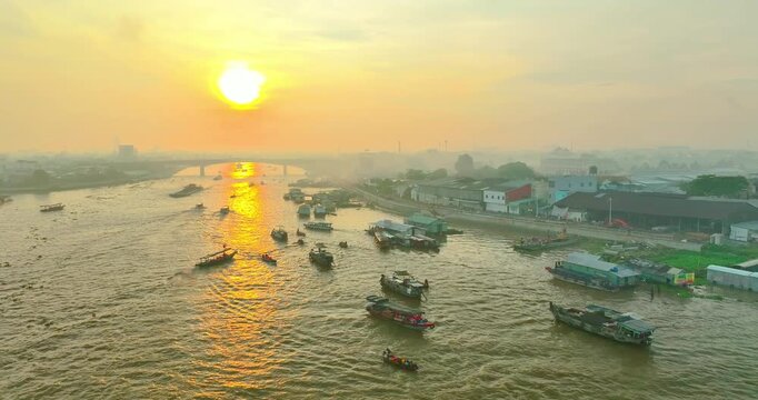 Bustling morning at Cai Rang Floating Market in Can Tho, Vietnam, where dozens of boats trade fresh fruits and agricultural products along the Mekong River