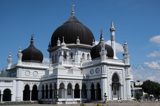 Majestic Zahir Mosque in Alor Setar, Kedah, Malaysia with black domes, religious landmark spiritual traditional exterior monument historic traveling city