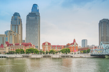Obraz premium The modern urban architecture skyline and Haihe River scenery in Tianjin, China were captured on April 11, 2025