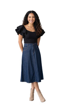 Beautiful Latina woman posing in stylish denim skirt outfit