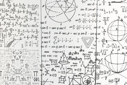 mathematical formulas, equations and geometric diagrams on chalkboard