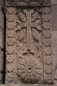 Detailed texture of medieval Armenian khachkar carved stone cross at Goshavank monastery