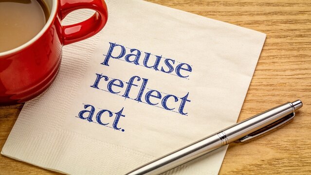 Minimalist note with red mug urging pause reflect act for mindfulness and productivity