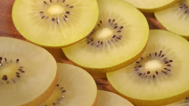 Fresh Yellow Kiwifruit in Wooden Bowl