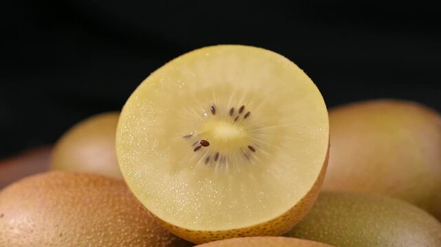 Fresh Yellow Kiwifruit in Wooden Bowl