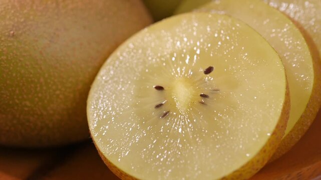 Fresh Yellow Kiwifruit in Wooden Bowl