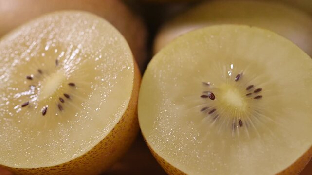 Fresh Yellow Kiwifruit in Wooden Bowl