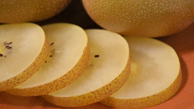 Fresh Yellow Kiwifruit in Wooden Bowl