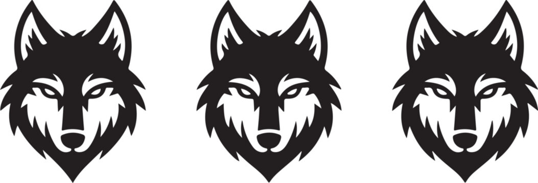 Set of three stylized wolf head icons, tribal wolf mascot logo design, vector illustration of a wolf head silhouette