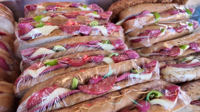 Fresh sandwiches packed in plastic wrap at local shop