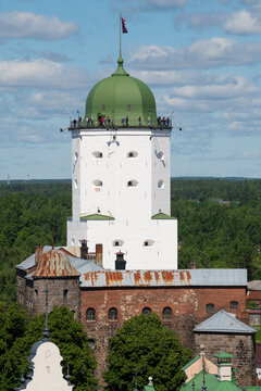 View of the ancient St. Olaf's tower on a sunny June day (vertical). Vyborg castle. Leningrad region