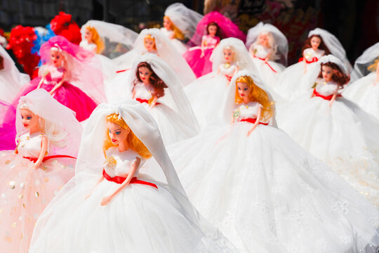 Istanbul, Turkey: May 18, 2026: Traditional bride dolls (gelin bebek) dressed in white wedding gowns for sale at a souvenir shop