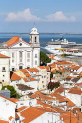 Fototapeta premium Lisbon skyline view of Alfama district with cruise ship in Lisbon, Portugal